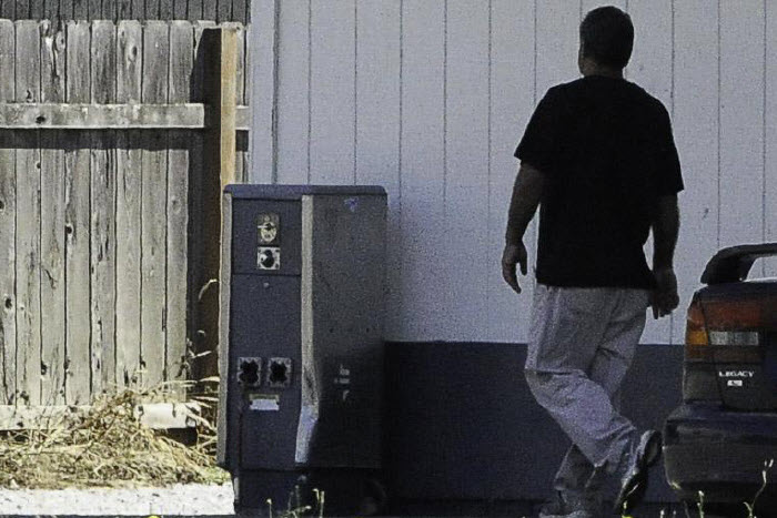 Suspect walking at gas station